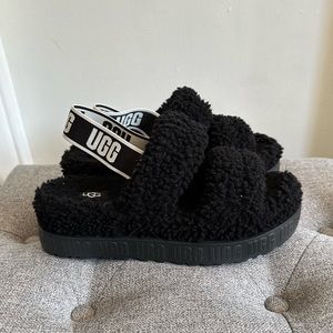 Black platform UGG slippers
